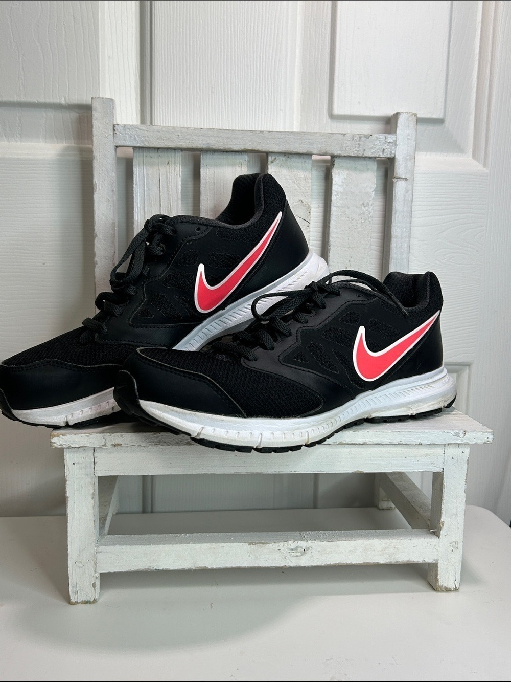 Nike Black Athletic Sneakers with Pink Swoosh